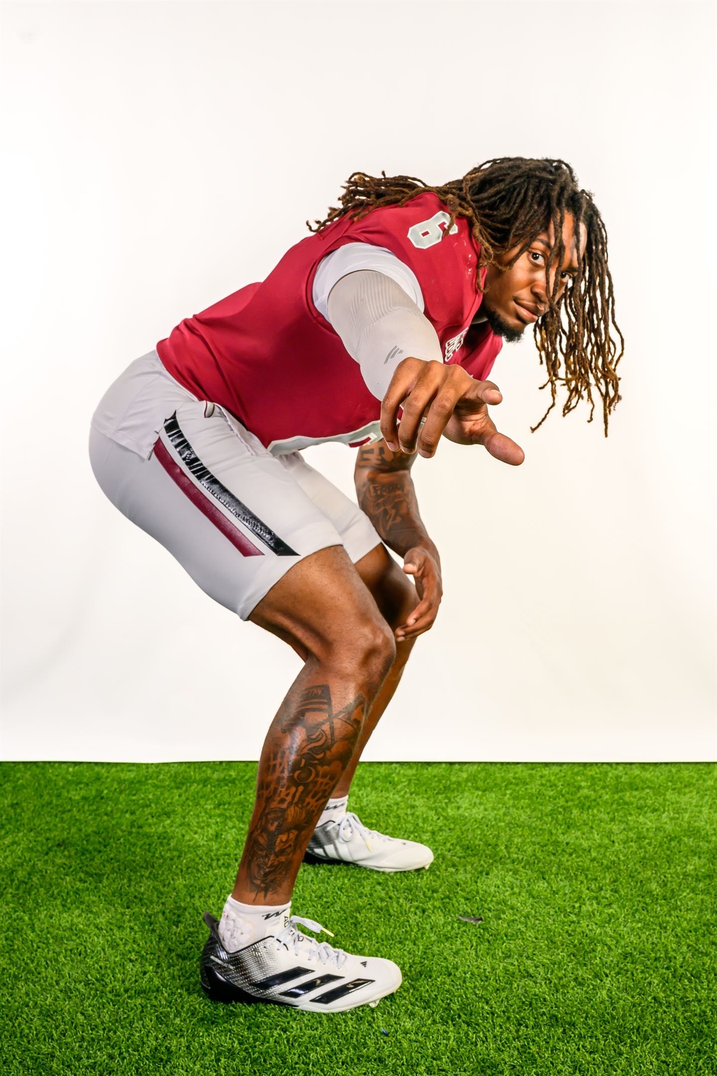 Justin Powe #06 — casual athletic wear on grass