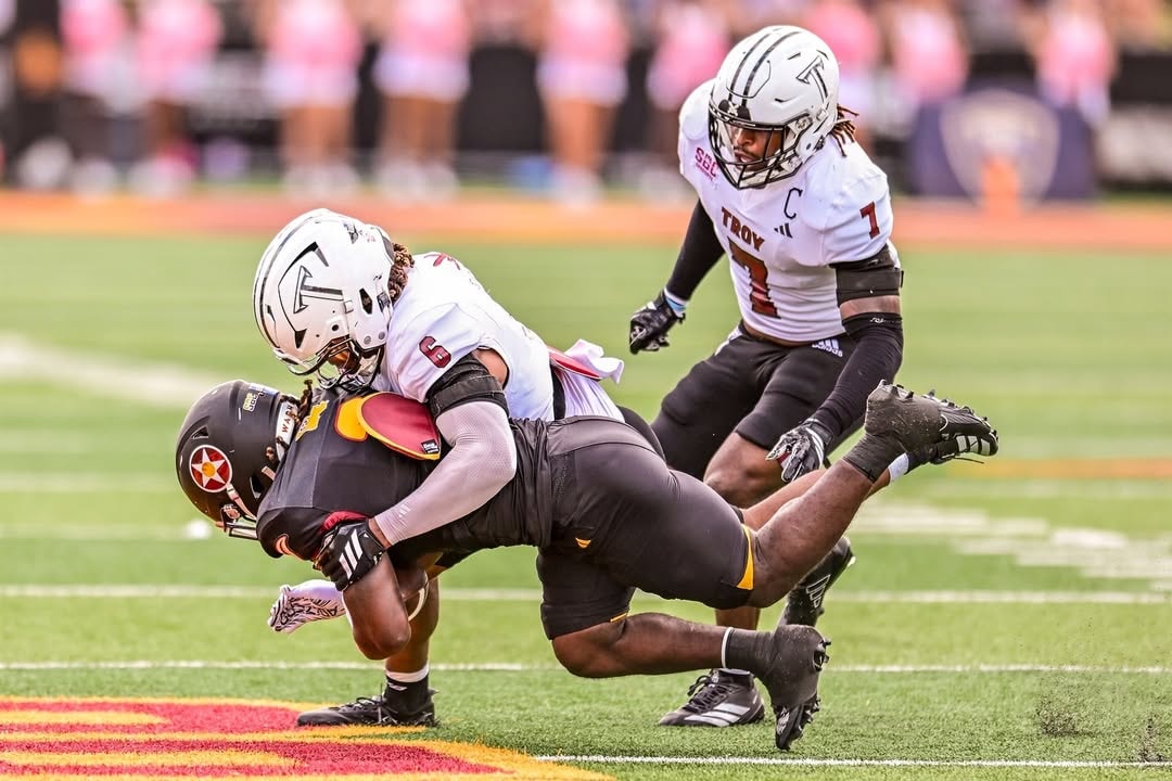 Defensive back coverage football game action