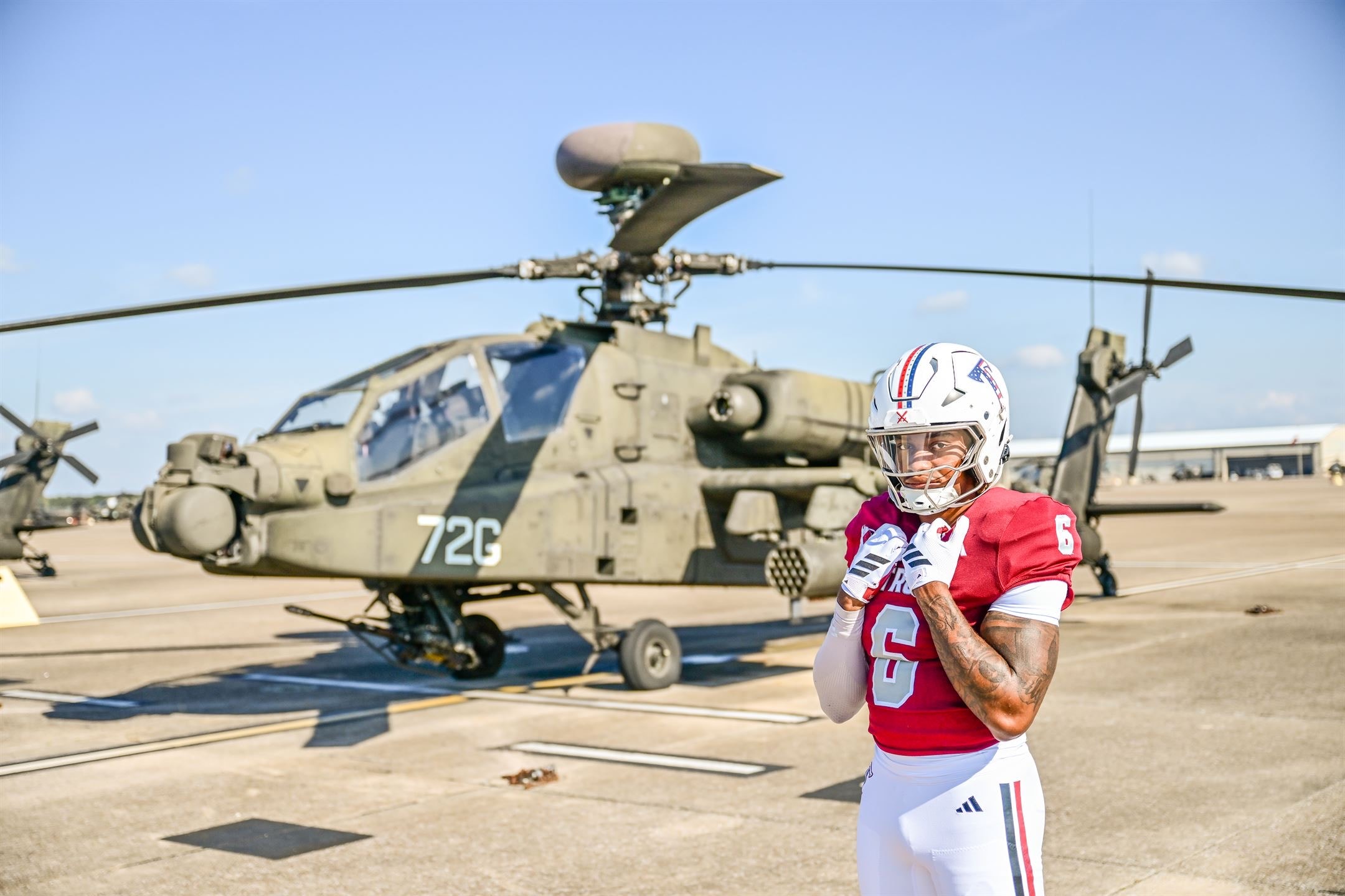 Justin Powe — focused stance on airfield