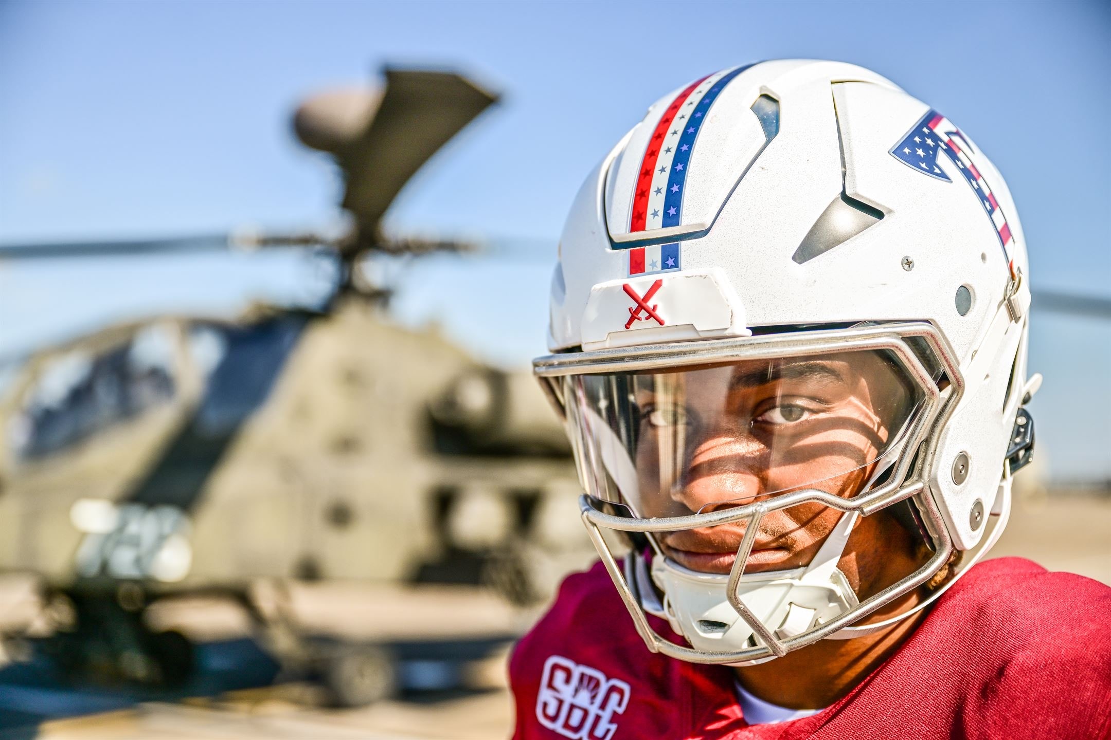 Justin Powe — helmet closeup, visor reflection